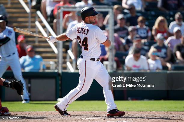 Chris Heisey of the Minnesota Twins in action during the Spring Training game against the St. Louis Cardinals at Hammond Stadium on February 26, 2018...