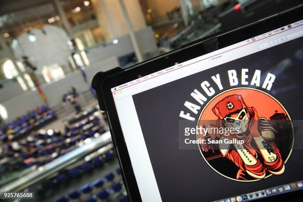 In this photo illustration artwork found on the Internet showing Fancy Bear is seen on the computer of the photographer during a session in the...