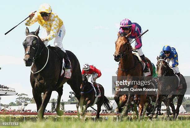 Corey Brown riding Monaco Consul celebrate winning the AAMI Victoria Derby during the 2009 Victoria Derby Day meeting at Flemington Racecourse on...