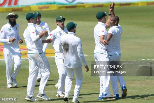 Vernon Philander of the Proteas celebrates the wicket of Cameron Bancroft of Australia with his team mates during day 1 of the 1st Sunfoil Test match...