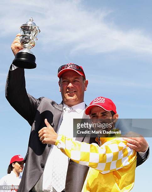Trainer Michael Moroney and jockey Corey Brown celebrate after Monaco Consul won the AAMI Victoria Derby during the 2009 Victoria Derby Day meeting...