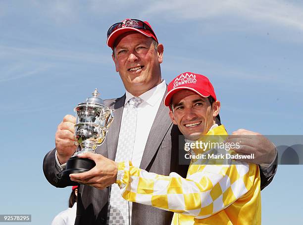 Trainer Michael Moroney and jockey Corey Brown celebrate after Monaco Consul won the AAMI Victoria Derby during the 2009 Victoria Derby Day meeting...