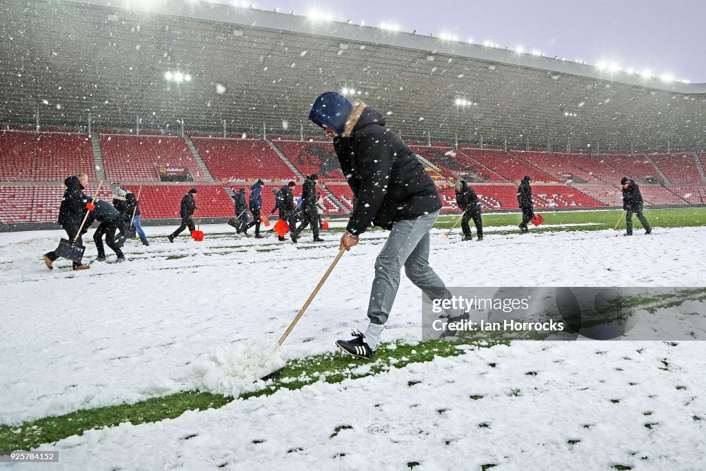 Sunderland Fans, Staff and Board Members Clear the Pitch at the Stadium of Light