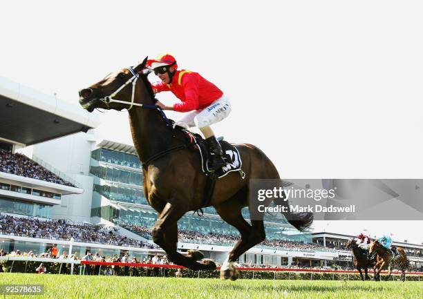 Jockey Luke Nolen riding Typhoon Tracy wins the Myer Classic during the 2009 Victoria Derby Day meeting at Flemington Racecourse on October 31, 2009...