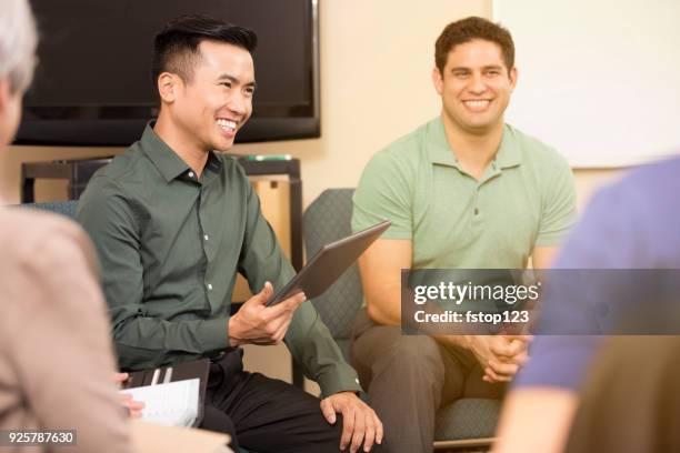 multi-ethnic group counseling session, support meeting. - addiction recovery stock pictures, royalty-free photos & images