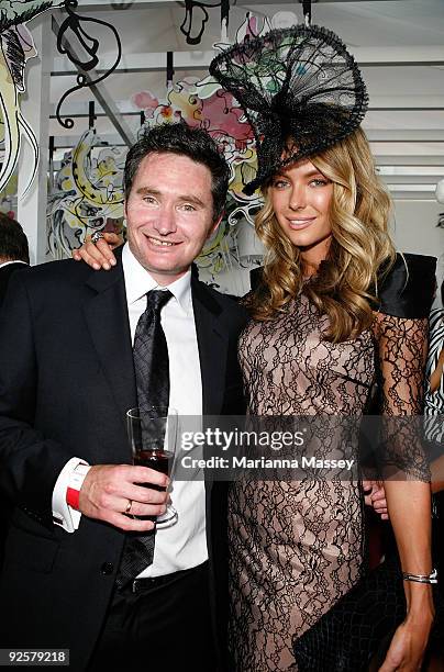 Jennifer Hawkins and Dave Hughes in the Myer marquee during the AAMI Victoria Derby Day at Flemington Racecourse on October 31, 2009 in Melbourne,...