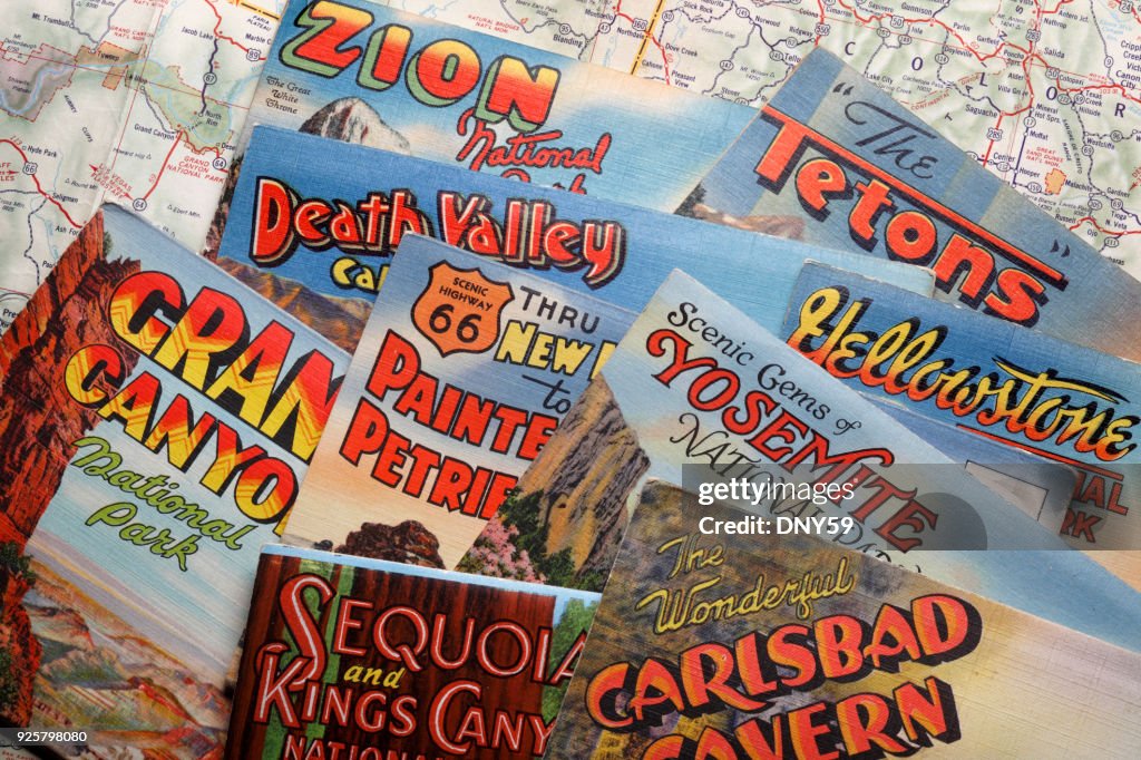 Vintage Postcards Of Various U.S. National Parks On A Road Map