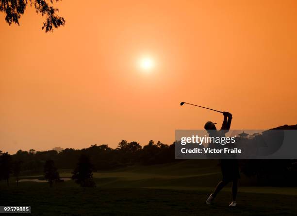 Jordan Sherratt of Australia plays his second shot on the 18th hole during the day three of Asian Amateur Championship at the Mission Hills Golf Club...