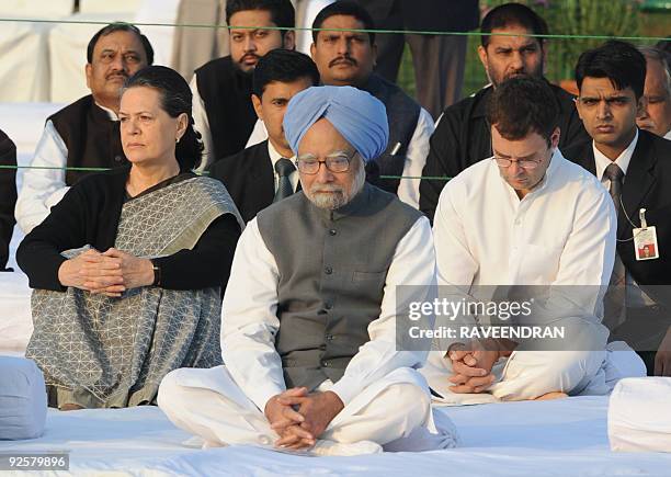 Indian Prime Minister Manmohan Singh , Member of Parliament and All India Congress Committee General Secretary Rahul Gandhi , and Congress Party...