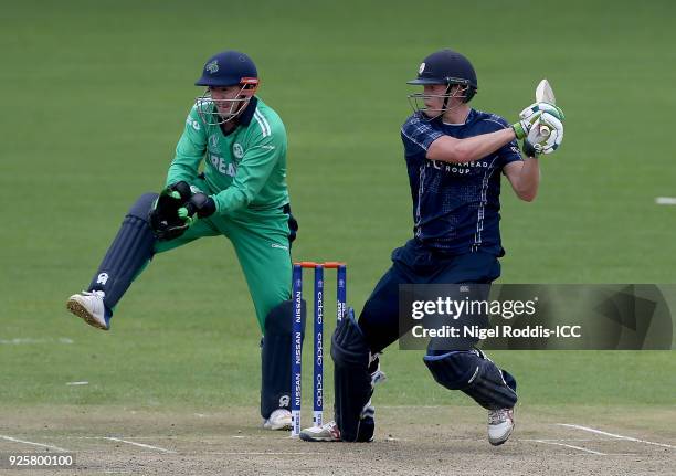 Michael Leask of Scotland plays a shot past Niall O'Brien of Ireland during the ICC Cricket World Cup Qualifier Warm Up between Scotland and Ireland...