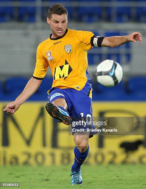 Jason Culina of the Gold Coast passes the ball during the round 13 A-League match between Gold Coast United and Perth Glory at Skilled Park on...