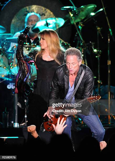 Mick Fleetwood, Stevie Nicks and Lindsey Buckingham of Fleetwood Mac perform during their 'Unleashed' tour at Wembley Arena on October 30, 2009 in...