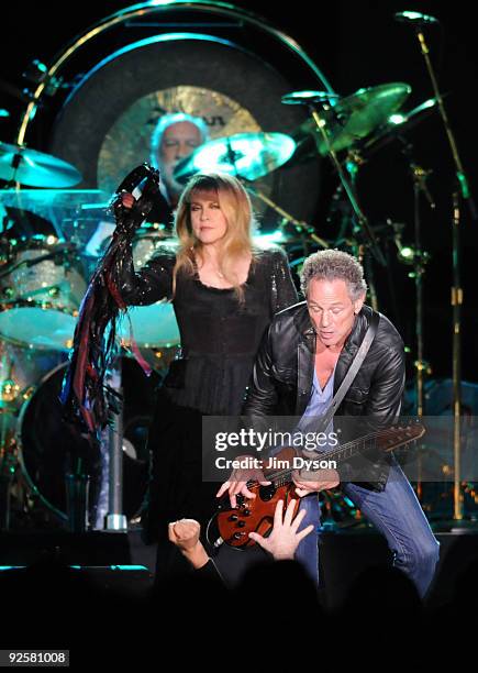 Mick Fleetwood, Stevie Nicks and Lindsey Buckingham of Fleetwood Mac perform during their 'Unleashed' tour at Wembley Arena on October 30, 2009 in...