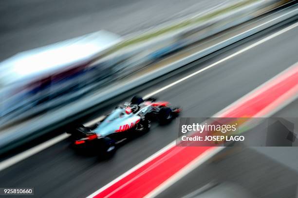 Team's Danish driver Kevin Magnussen drives at the Circuit de Catalunya on March 1, 2018 in Montmelo on the outskirts of Barcelona during the fourth...