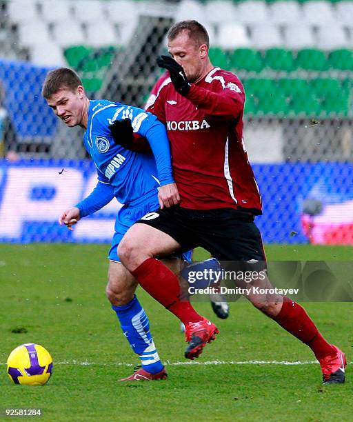 Martin Jakubko of FC Moscow battles for the ball with Igor Denisov of FC Zenit St. Petersburg during the Russian Football League Championship match...