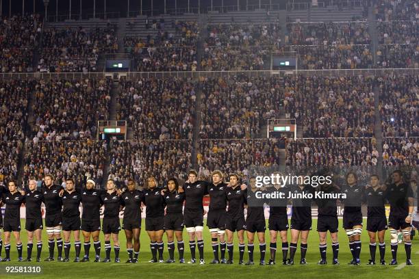 Players of the All Blacks line up for the national anthem during the 2009 Bledisloe Cup match between the New Zealand All Blacks and the Australian...