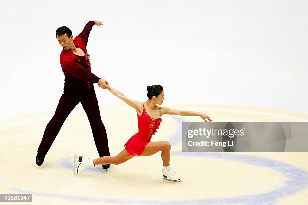 Gold medalists Shen Xue and Zhao Hongbo of China skate in the Pairs Free Skating during the Cup of China ISU Grand Prix of Figure Skating 2009 at...