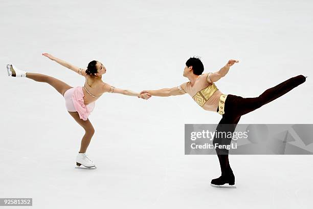 Silver medalists Zhang Dan and Zhang Hao of China skate in the Pairs Free Skating during the Cup of China ISU Grand Prix of Figure Skating 2009 at...
