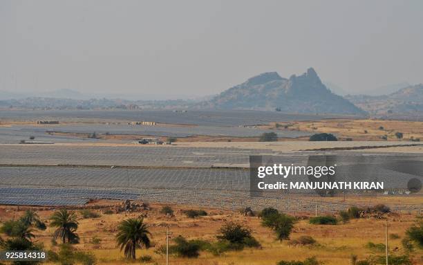 Rows of of solar panels face the sun at "Shakti Sthala", the 2000 Megawatt solar power park in Pavagada Taluk, situated about 150 kms from Bangalore...