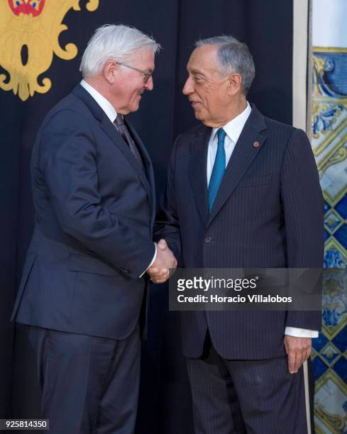 Portuguese President Marcelo Rebelo de Sousa and German President Frank-Walter Steinmeier shake hands before their meeting in Belem Presidential...