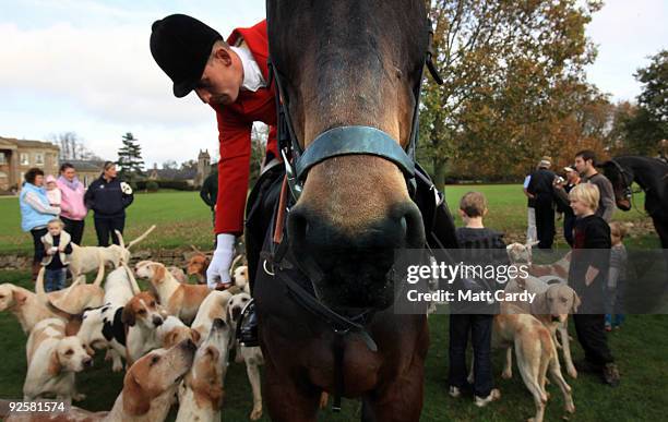 Members and supporters of the Avon Vale Hunt gather at the Hunt's first meet of the season in front of Neston House on October 31, 2009 in Neston,...