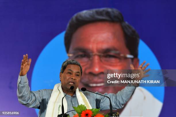 Karnataka Chief Minister, Siddaramaiah, gestures while addressing the gathering during the inauguration of "Shakti Sthala", the 1st phase of 2000...