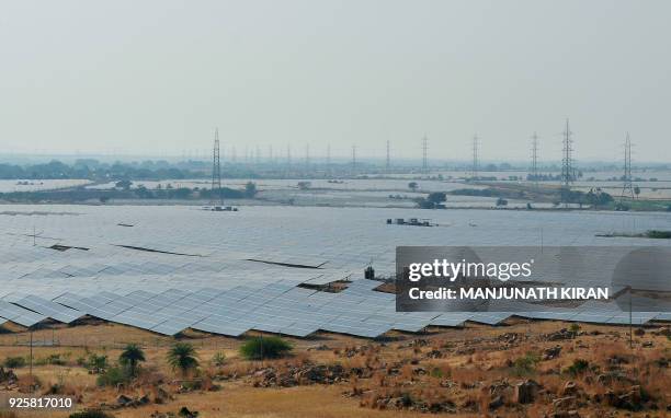 Rows of of solar panels face the sun at "Shakti Sthala", the 2000 Megawatt solar power park in Pavagada Taluk, situated about 150 kms from Bangalore...