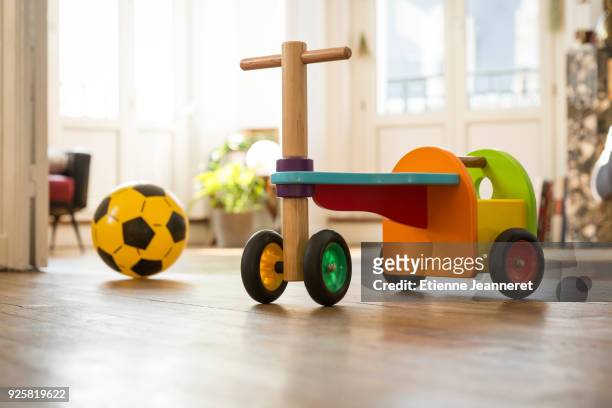 wood colored kid truck in the living room, nancy, france - toy stock-fotos und bilder