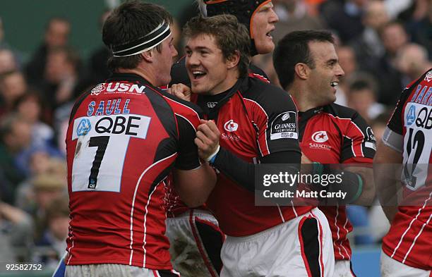 Saracens players celebrate Andy Saull's opening try during the Bath Rugby v Saracens Guinness Premiership match at the Bath Recreation Ground on...