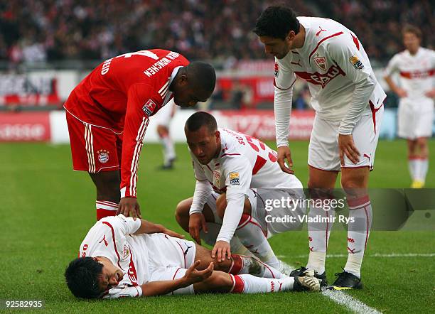 Ricardo Osorio of Stuttgart lies on the pitch after picking up an injury during the Bundesliga match between VfB Stuttgart and FC Bayern Muenchen at...