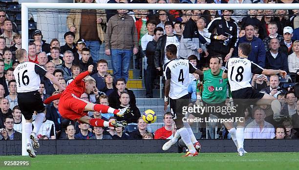 Andriy Voronin of Liverpool has an early attempt on goal during the Barclays Premier League match between Fulham and Liverpool at Craven Cottage on...