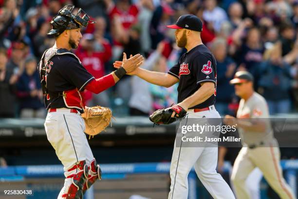 Catcher Yan Gomes of the Cleveland Indians and closing pitcher Cody Allen celebrate after winning against the Baltimore Orioles at Progressive Field...