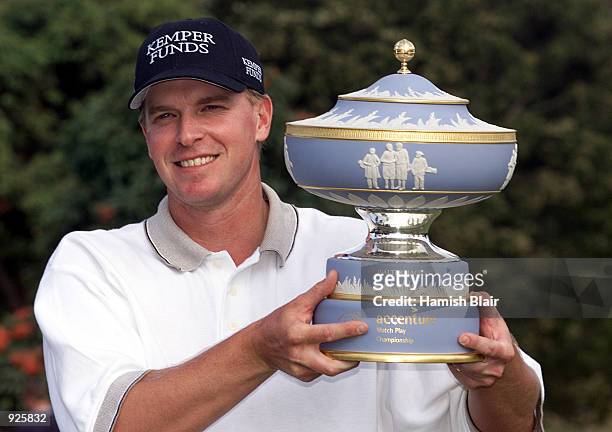 Steve Stricker of the USA with the trophy after defeating Pierre Fulke of Sweden in the championship match 2 & 1, during the 2001 Accenture Match...