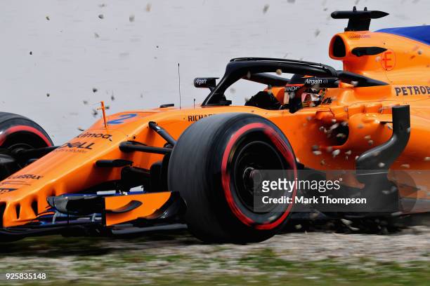 Stoffel Vandoorne of Belgium driving the McLaren F1 Team MCL33 Renault runs into the gravel during day four of F1 Winter Testing at Circuit de...