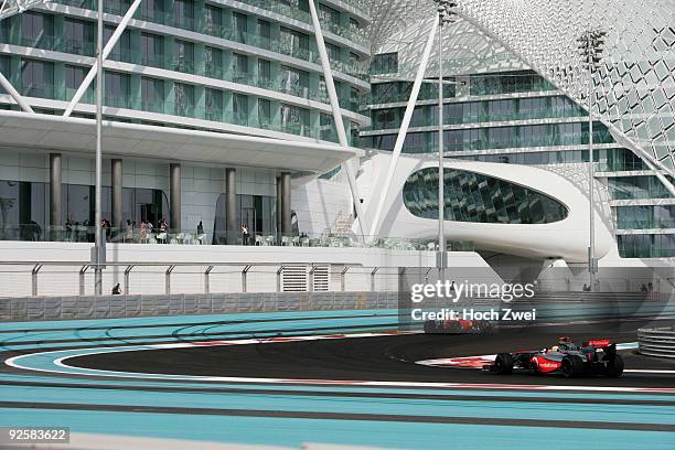 Lewis Hamilton of Great Britain and McLaren Mercedes drives on his way to taking pole position during qualifying for the Abu Dhabi Formula One Grand...