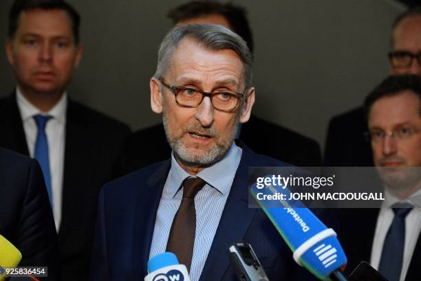The head of the Parliamentary Control Panel Armin Schuster talks to journalists after a meeting with PKGr's members on March 1, 2018 at the...