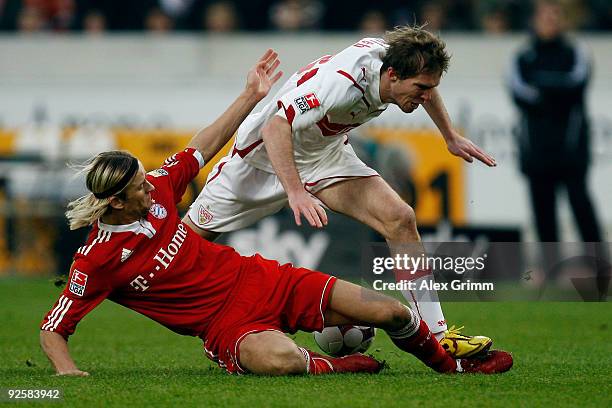 Aliaksandr Hleb of Stuttgart is challenged by Anatoliy Timoshchuk of Muenchen during the Bundesliga match between VfB Stuttgart and Bayern Muenchen...