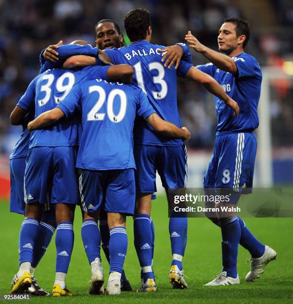 Deco celebrates his goal for Chelsea with his team mates during the Barclays Premier League match between Bolton and Chelsea at the Reebok Stadium on...