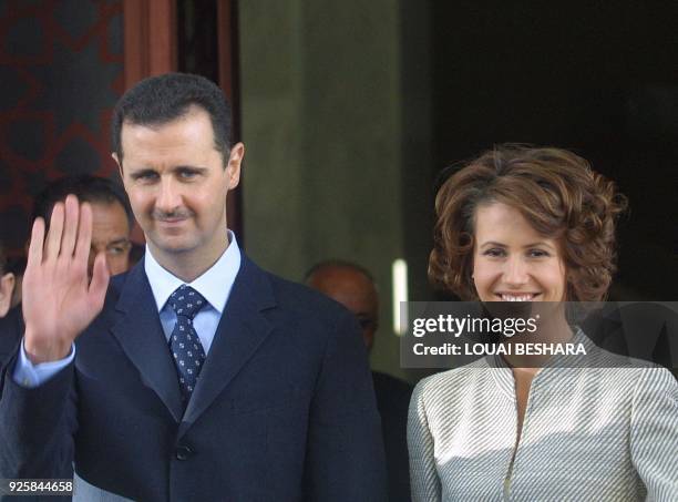 Syrian President Bashar al-Assad and his wife Asma welcome Malaysia's King Tuanku Syed Sirajuddin and Queen Tuanku Fauziah Tengku Abdul Rashid during...