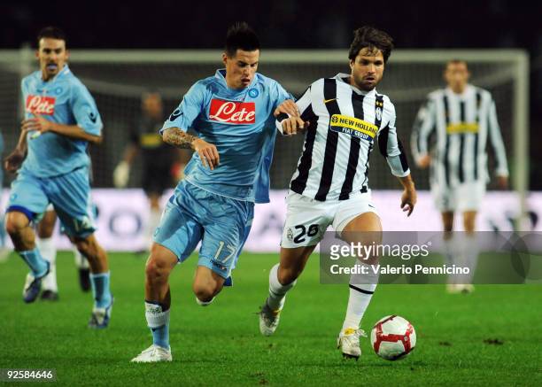 Ribas Da Cunha Diego of Juventus FC battles for the ball with Marek Hamsik of SSC Napoli during the Serie A match between Juventus FC and SSC Napoli...
