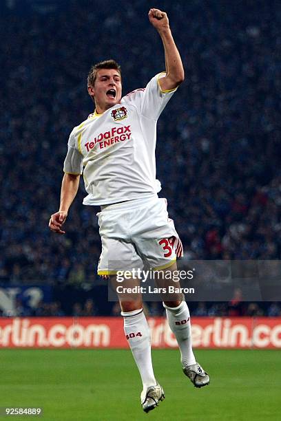 Toni Kroos of Leverkusen celebrates scoring his team's first goal during the Bundesliga match between FC Schalke 04 and Bayer 04 Leverkusen at the...