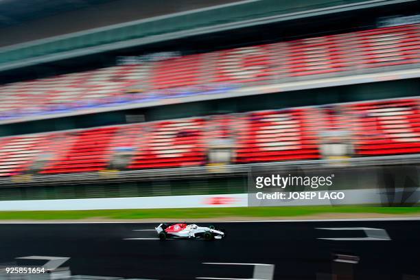 Sauber F1 Team's Swedish driver Marcus Ericsson drives at the Circuit de Catalunya on March 1, 2018 in Montmelo on the outskirts of Barcelona during...