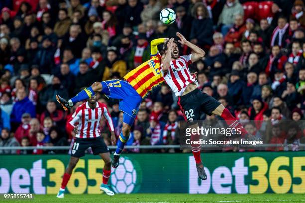 Francis Coquelin of Valencia CF, Raul Garcia of Athletic Bilbao during the La Liga Santander match between Athletic de Bilbao v Valencia at the...