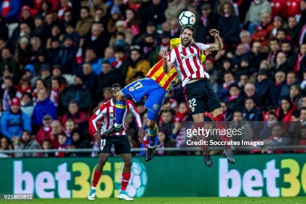 Francis Coquelin of Valencia CF. Raul Garcia of Athletic Bilbao during the La Liga Santander match between Athletic de Bilbao v Valencia at the...