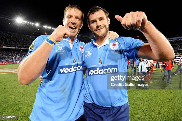 Bakkies Botha and Danie Rossouw celebrate victory after the Absa Currie Cup Final match between Blue Bulls and Free State Cheetahs from Loftus...