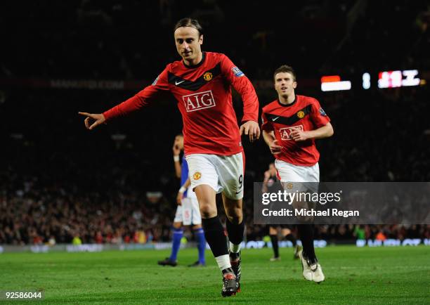 Dimitar Berbatov of Manchester United celebrates scoring the first goal with team mate Michael Carrick during the Barclays Premier League match...