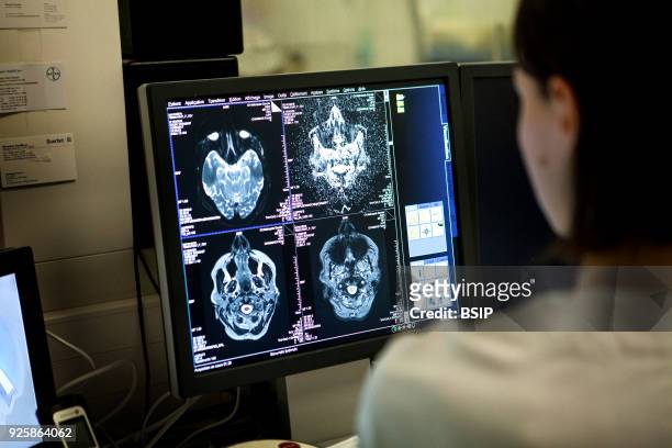 Medical imaging service in a hospital in Savoie, France. A technician monitors a brain MRI scan session.