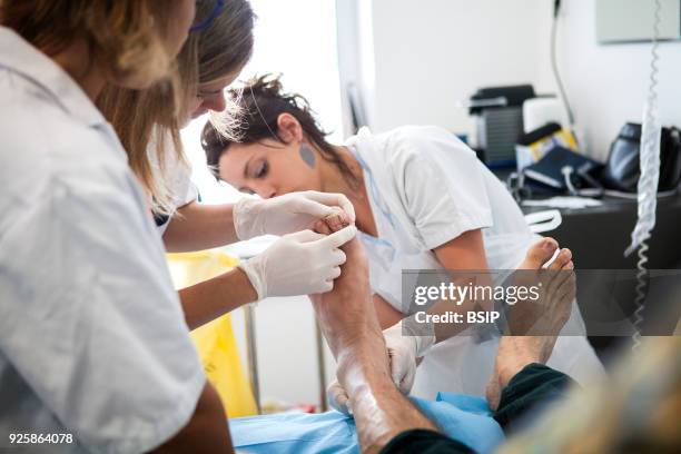 Diabetic feet consultations, Savoie, France, specialized team devoted to treatment and after-care for diabetic patients foot lesions. The nurse and...