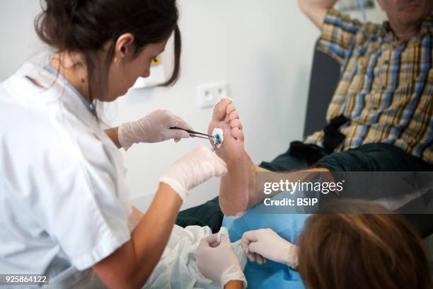 Diabetic feet consultations, Savoie, France, specialized team devoted to treatment and after-care for diabetic patients foot lesions. The nurse...