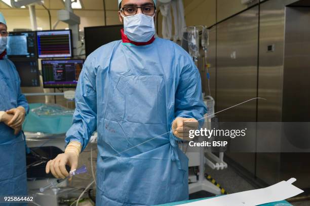 Radiofrequency ablation of cardiac arrhythmia using the Stereotaxis robotic system, by inserting a catheter into the heart, emitting radio waves that...